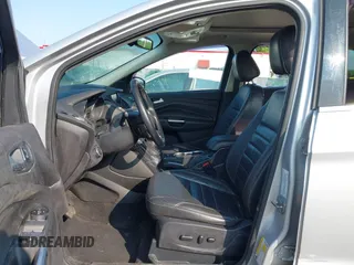 2015 Ford Escape Titanium z VIN 1FMCU0J90FUC02039, wystawiony jako IAAI lot #42369882 z przebiegiem 156 287 mil mil oraz . Historia ofert i sprzedaży dostępna na DreamBid. Obrazek 5.