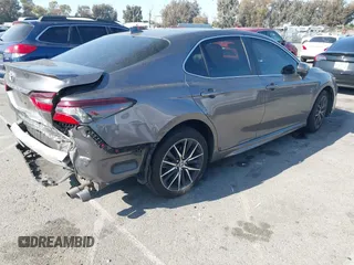 2021 Toyota Camry SE Nightshade with VIN 4T1G11AK7MU548170, listed as a IAAI auction lot 41988867 with 65,877 mi miles and . Bid and sale history available at carsss.com. Image 4.