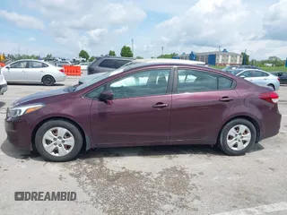 2018 Kia Forte LX with VIN 3KPFK4A70JE165286, listed as a IAAI auction lot 42128779 with 124,348 mi miles. Bid and sale history available at carsss.com. Image 14.