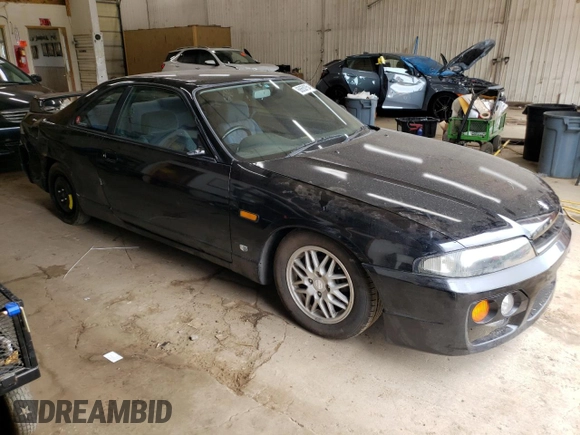 1997 Nissan Skyline z VIN HR33101590, wystawiony jako Copart lot #68650354 z przebiegiem 76 082 mil mil oraz Szkoda całkowita • Salvage title. Historia ofert i sprzedaży dostępna na DreamBid. Obrazek 4.