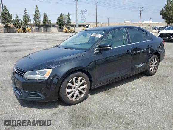 2013 Volkswagen Jetta SE with VIN 3VWDX7AJ6DM438180, listed as a Copart auction lot 59582655 with 106,082 mi miles and Salvage title. Bid and sale history available at DreamBid. Image 1.