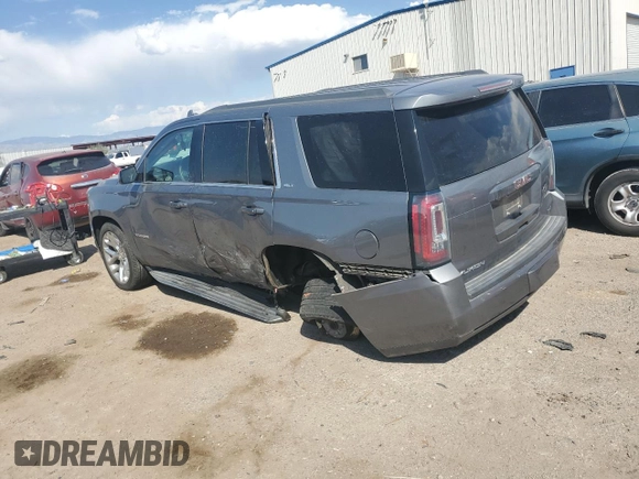 2019 GMC Yukon SLT with VIN 1GKS2BKC5KR310542, listed as a Copart auction lot 75235994 with 20,358 mi miles and Salvage Title. Bid and sale history available at DreamBid. Image 2.
