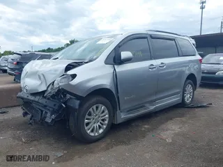 2016 Toyota Sienna XLE with VIN 5TDYK3DC5GS760841, listed as a IAAI auction lot 39797448 with 69,681 mi miles. Bid and sale history available at carsss.com. Image 19.