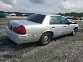 2001 Mercury Grand Marquis LS z VIN 2MEFM75W31X704781, wystawiony jako Copart lot #54613735 z przebiegiem 191 323 mil mil oraz Szkody całkowita. Historia ofert i sprzedaży dostępna na DreamBid. Obrazek 3.