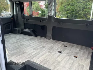 2021 Ford Transit Passenger XL with VIN 1FDAX2C80MKA72528, listed as a Copart auction lot 79310354 with 22,100 mi miles and Salvage Title. Bid and sale history available at DreamBid. Image 6.