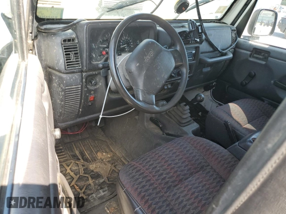 1999 Jeep Wrangler Sport with VIN 1J4FY19SXXP464096, listed as a Copart auction lot 61233105 with 167,350 mi miles and Clean title. Bid and sale history available at DreamBid. Image 8.