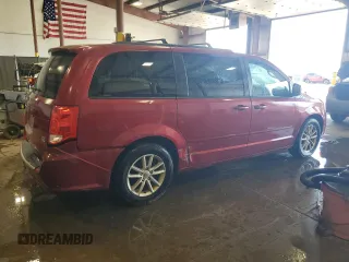 2014 Dodge Grand Caravan SXT with VIN 2C4RDGCG6ER122145, listed as a Copart auction lot 54435605 with 156,196 mi miles and Salvage Title. Bid and sale history available at DreamBid. Image 3.