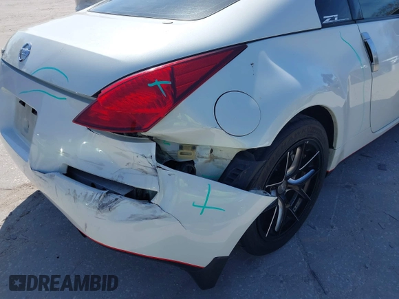 2004 Nissan 350Z Touring with VIN JN1AZ34E74T064156, listed as a IAAI auction lot 41498213 with 148,370 mi miles. Bid and sale history available at carsss.com. Image 6.