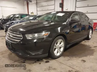 2015 Ford Taurus SE with VIN 1FAHP2D81FG159514, listed as a IAAI auction lot 41641336 with 110,137 mi miles and . Bid and sale history available at carsss.com. Image 2.