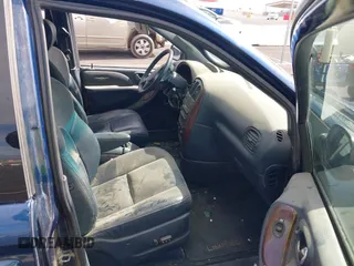 2001 Chrysler Town & Country Limited with VIN 2C8GP64L81R128221, listed as a IAAI auction lot 41630779 with 275,215 mi miles. Bid and sale history available at carsss.com. Image 5.