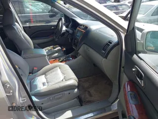 2004 Acura MDX Touring Pkg with VIN 2HNYD18664H517854, listed as a IAAI auction lot 41979134 with 144,713 mi miles. Bid and sale history available at carsss.com. Image 5.