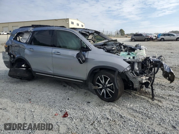 2022 Honda Pilot Touring 7-Passenger with VIN 5FNYF6H66NB019562, listed as a Copart auction lot 43752405 with 0 mi miles and Salvage Title. Bid and sale history available at carsss.com. Image 4.