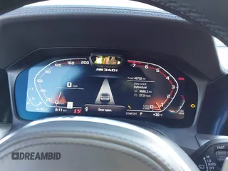 2020 BMW 3 Series M340i xDrive with VIN WBA5U9C00LFH73594, listed as a IAAI auction lot 41574837 with 46,702 mi miles and . Bid and sale history available at DreamBid. Image 7.