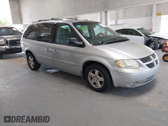 2005 Dodge Caravan SXT with VIN 2D4GP44L65R335656, listed as a IAAI auction lot 42526728 with 322,176 mi miles and . Bid and sale history available at DreamBid. Image 1.