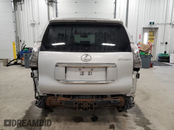 2014 Lexus GX 460 Luxury z VIN JTJJM7FX2E5069205, wystawiony jako Copart lot #89219335 z przebiegiem 154 878 mil mil oraz Szkody całkowita. Historia ofert i sprzedaży dostępna na DreamBid. Obrazek 6.