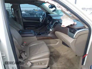 2015 Chevrolet Suburban LT with VIN 1GNSKJKC0FR309866, listed as a IAAI auction lot 41743848 with 220,778 mi miles and . Bid and sale history available at DreamBid. Image 5.
