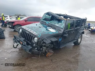 2018 Jeep Wrangler Unlimited Rubicon Recon with VIN 1C4BJWFG3JL840951, listed as a IAAI auction lot 41474583 with 121,971 mi miles and . Bid and sale history available at DreamBid. Image 2.