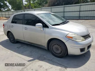 2009 Nissan Versa S with VIN 3N1BC11E39L376873, listed as a Copart auction lot 60299465 with 134,769 mi miles and Salvage title. Bid and sale history available at DreamBid. Image 4.
