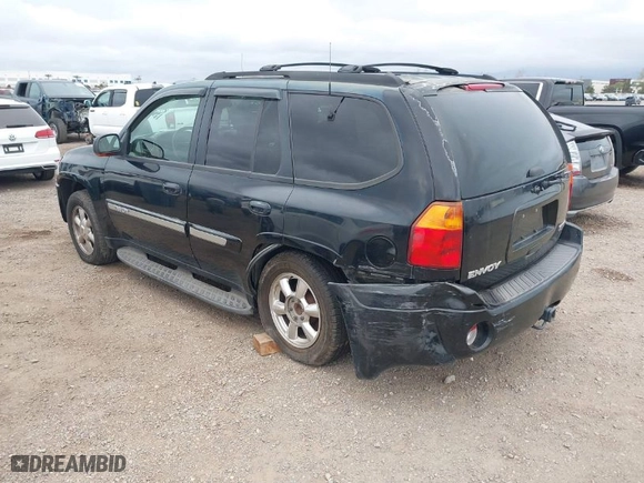 2003 GMC Envoy SLT with VIN 1GKDS13S232298062, listed as a IAAI auction lot 41668380 with 195,045 mi miles. Bid and sale history available at carsss.com. Image 3.