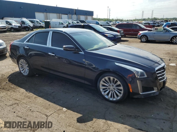 2015 Cadillac CTS Luxury AWD with VIN 1G6AX5SX7F0125516, listed as a Copart auction lot 61072735 with 111,448 mi miles and Clean title. Bid and sale history available at DreamBid. Image 4.