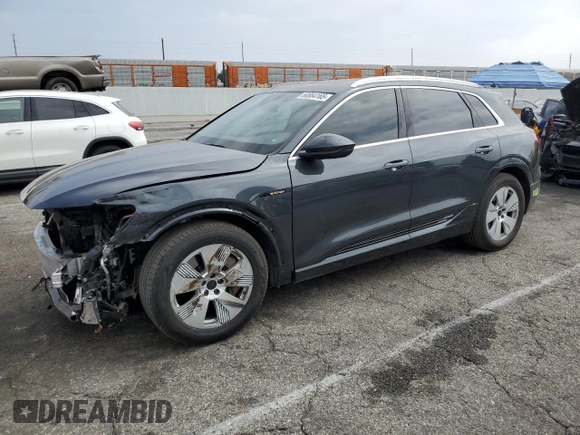 2019 Audi e-tron Premium Plus with VIN WA1LABGE3KB014614, listed as a Copart auction lot 60864165 with 37,718 mi miles and Salvage title. Bid and sale history available at DreamBid. Image 1.