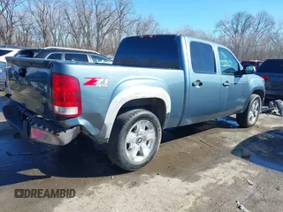 2007 GMC Sierra 1500 SLT z VIN 2GTEK133X71616220, wystawiony jako IAAI lot #41669281 z przebiegiem 269 626 mil mil oraz . Historia ofert i sprzedaży dostępna na DreamBid. Obrazek 4.