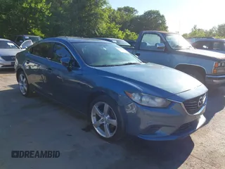 2014 Mazda 6 i Touring with VIN JM1GJ1V65E1117816, listed as a IAAI auction lot 42291164 with 238,276 mi miles and . Bid and sale history available at DreamBid. Image 1.