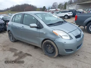 2009 Toyota Yaris with VIN JTDKT903695257498, listed as a IAAI auction lot 41832557 with 137,995 mi miles. Bid and sale history available at carsss.com. Image 1.