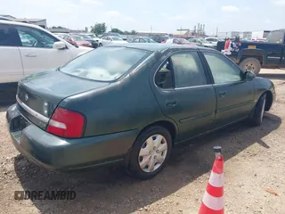 2001 Nissan Altima GXE with VIN 1N4DL01D81C188606, listed as a IAAI auction lot 42088829 with 13 mi miles. Bid and sale history available at carsss.com. Image 4.