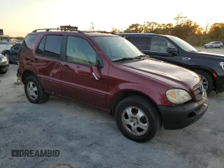 2002 Mercedes-Benz M-Class with VIN 4JGAB54E72A300774, listed as a Copart auction lot 75990134 with 312,541 mi miles and Salvage Title. Bid and sale history available at carsss.com. Image 4.