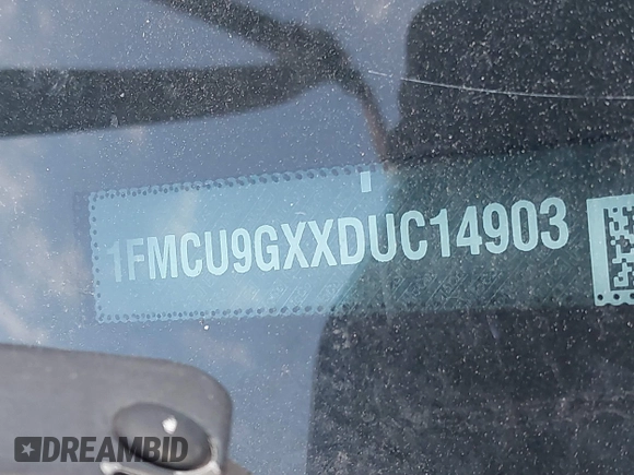 2013 Ford Escape SE with VIN 1FMCU9GXXDUC14903, listed as a IAAI auction lot 41826982 with 166,233 mi miles and . Bid and sale history available at DreamBid. Image 9.