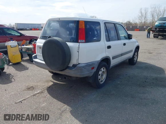2000 Honda CR-V LX with VIN JHLRD1841YC062688, listed as a IAAI auction lot 41831701 with 157,115 mi miles. Bid and sale history available at carsss.com. Image 4.