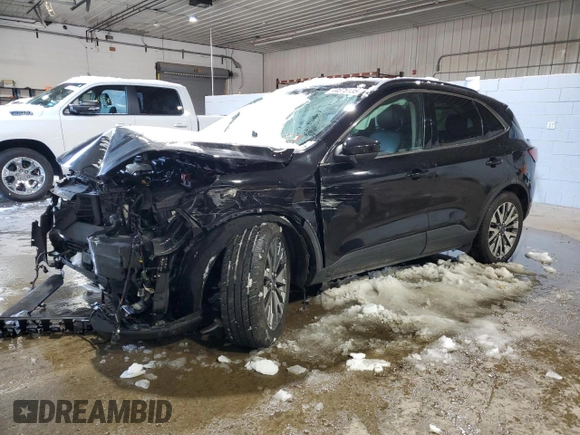 2021 Ford Escape Titanium with VIN 1FMCU9J91MUA57451, listed as a Copart auction lot 44678135 with 74,795 mi miles and Salvage title. Bid and sale history available at DreamBid. Image 1.