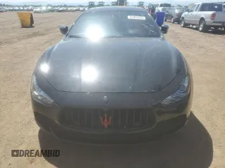 2016 Maserati Ghibli S z VIN ZAM57RSA6G1173551, wystawiony jako Copart lot #61822555 z przebiegiem 90 063 mil mil oraz Czysty tytuł • Clean title. Historia ofert i sprzedaży dostępna na DreamBid. Obrazek 5.