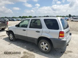 2002 Ford Escape XLT Choice with VIN 1FMYU03142KA49202, listed as a Copart auction lot 56359445 with Not provided miles and Clean title. Bid and sale history available at DreamBid. Image 2.