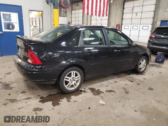 2000 Ford Focus with VIN 1FAHP3430YW406024, listed as a Copart auction lot 86580314 with 99,158 mi miles and Clean title. Bid and sale history available at DreamBid. Image 3.