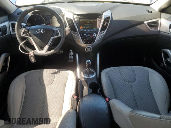 2012 Hyundai Veloster w/Black Int с VIN KMHTC6ADXCU072938, выставлен на аукционе Copart как лот 56767105 с пробегом 110 562 миль миль и Чистый • Clean title. История ставок и продаж доступна на DreamBid. Изображение 8.