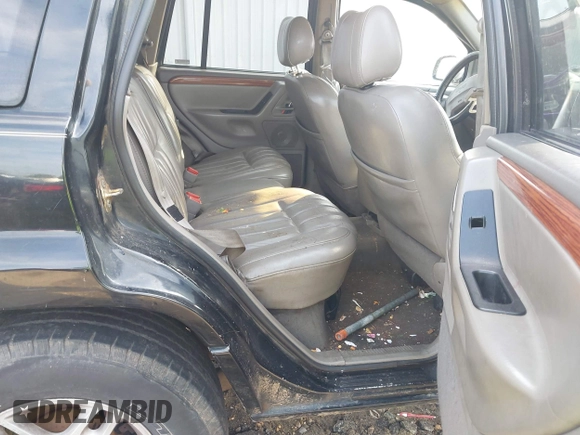 1999 Jeep Grand Cherokee Limited with VIN 1J4GW68S8XC588500, listed as a IAAI auction lot 41484787 with 161,961 mi miles. Bid and sale history available at carsss.com. Image 8.