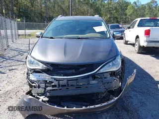 2017 Chrysler Pacifica Limited with VIN 2C4RC1GG1HR512911, listed as a IAAI auction lot 41850887 with 147,403 mi miles and . Bid and sale history available at DreamBid. Image 12.