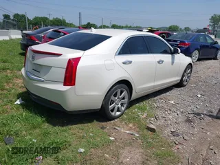 2013 Cadillac ATS with VIN 1G6AA5RA1D0139105, listed as a IAAI auction lot 42264614 with 69,049 mi miles and . Bid and sale history available at DreamBid. Image 4.