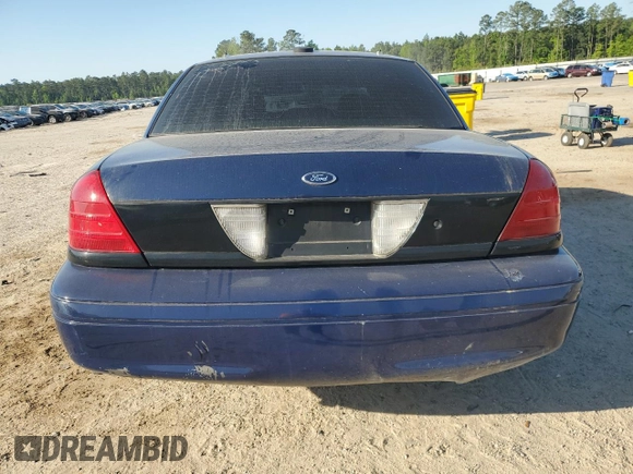 2004 Ford Police Interceptor Base w/3.27 Axle with VIN 2FAFP71W24X124818, listed as a Copart auction lot 53459295 with 153,125 mi miles and Salvage title. Bid and sale history available at DreamBid. Image 6.