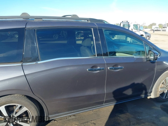 2018 Honda Odyssey Elite with VIN 5FNRL6H91JB052289, listed as a IAAI auction lot 41336068 with 94,685 mi miles and . Bid and sale history available at DreamBid. Image 12.