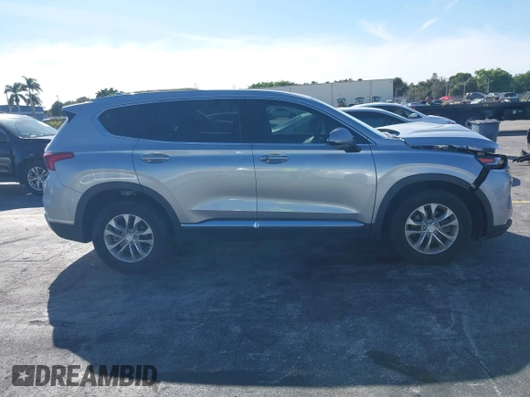 2020 Hyundai Santa Fe SEL with VIN 5NMS3CAD5LH218667, listed as a IAAI auction lot 41025347 with 81,632 mi miles and . Bid and sale history available at DreamBid. Image 13.
