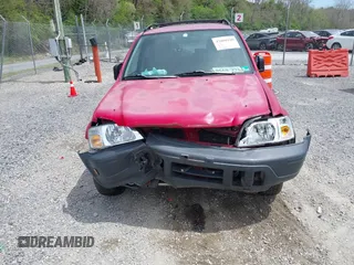 2000 Honda CR-V LX with VIN JHLRD184XYC010847, listed as a IAAI auction lot 42080100 with 256,678 mi miles and . Bid and sale history available at carsss.com. Image 6.