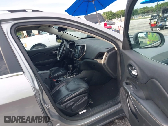 2016 Jeep Cherokee Limited with VIN 1C4PJLDB5GW164781, listed as a IAAI auction lot 42806344 with 137,283 mi miles and . Bid and sale history available at DreamBid. Image 5.