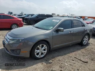 2012 Ford Fusion SE z VIN 3FAHP0HG5CR274675, wystawiony jako Copart lot #48785395 z przebiegiem 207 923 mil mil oraz Czysty tytuł • Clean title. Historia ofert i sprzedaży dostępna na DreamBid. Obrazek 1.