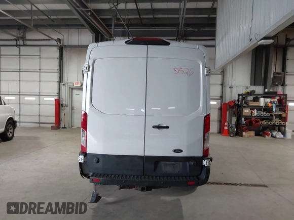 2019 Ford Transit with VIN 1FTBW2CM6KKB73059, listed as a IAAI auction lot 42143526 with 114,147 mi miles. Bid and sale history available at carsss.com. Image 16.