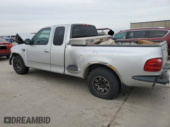 2000 Ford F-150 XL with VIN 1FTRX07L2YKA09673, listed as a Copart auction lot 48177615 with Not provided miles and Salvage title. Bid and sale history available at DreamBid. Image 2.