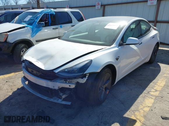 2022 Tesla Model 3 with VIN 5YJ3E1EA7NF103513, listed as a IAAI auction lot 41643592 with 35,631 mi miles and . Bid and sale history available at DreamBid. Image 23.