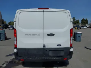 2020 Ford Transit Cargo with VIN 1FTBR1Y80LKA67205, listed as a IAAI auction lot 41805459 with 184,186 mi miles and . Bid and sale history available at DreamBid. Image 15.